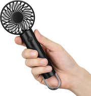 Black portable hand-held mini fan with adjustable speeds and clip held in hand