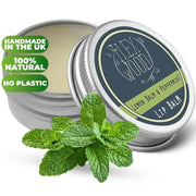 Lemon Balm and Peppermint Lip Balm in a reusable metal tin with fresh mint leaves, handmade, natural, and plastic-free packaging.